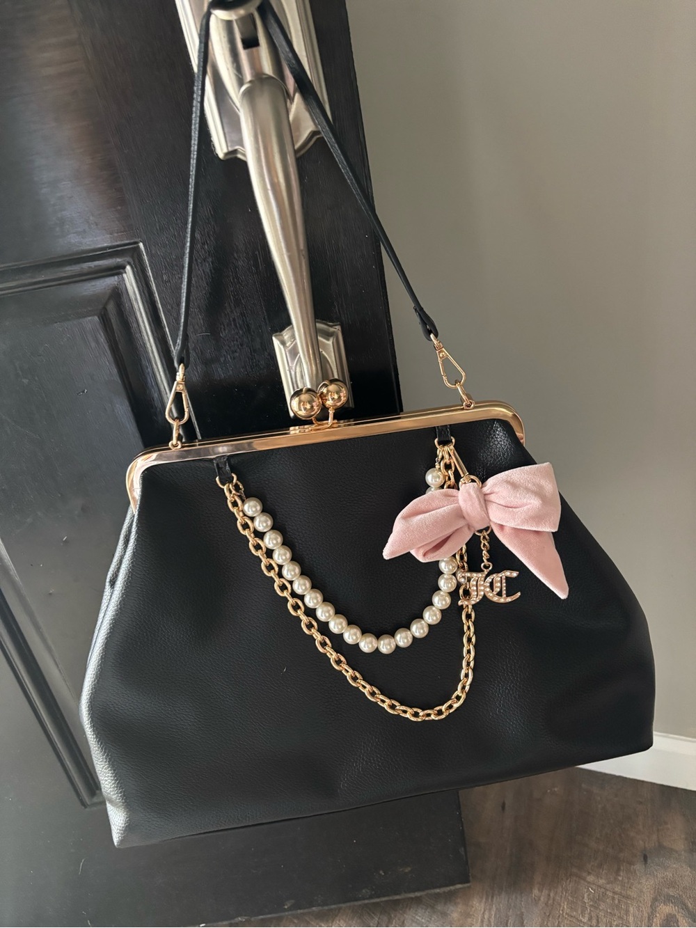 Juicy Couture Black Kiss lock Large frame with Gold Hardware and Pink Bow Charm